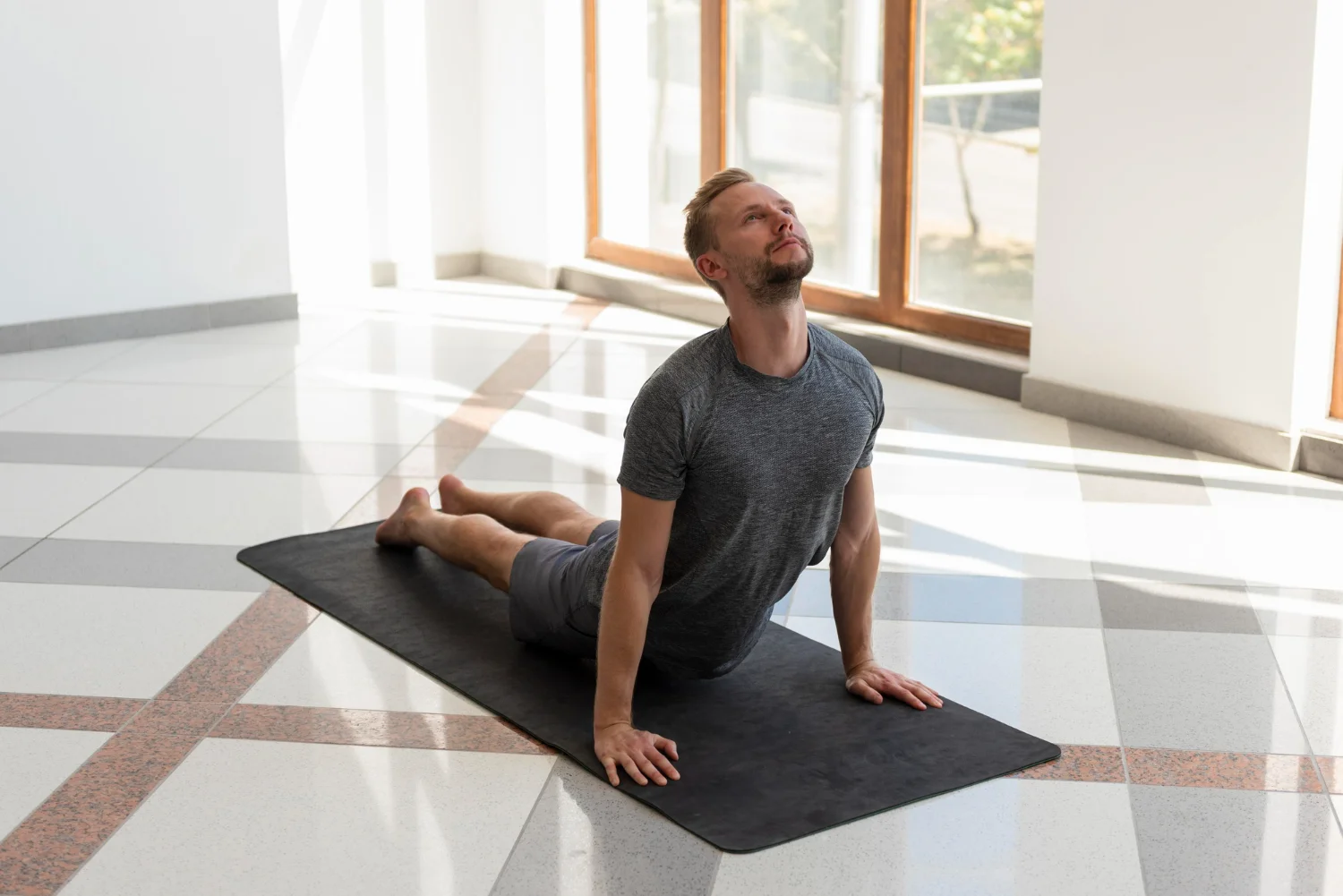 Man doing yoga for mental clarity and stress relief
