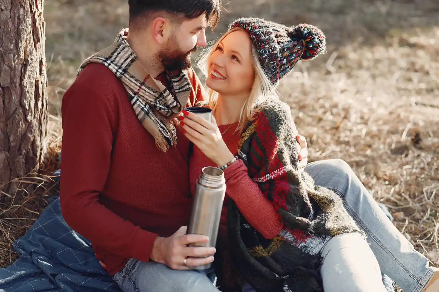 Couple sharing a warm drink on a Valentine's retreat